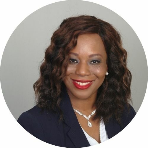 Tawanda L. Hines Tawanda L. Hines headshot with curly brown hair and black suit with white top